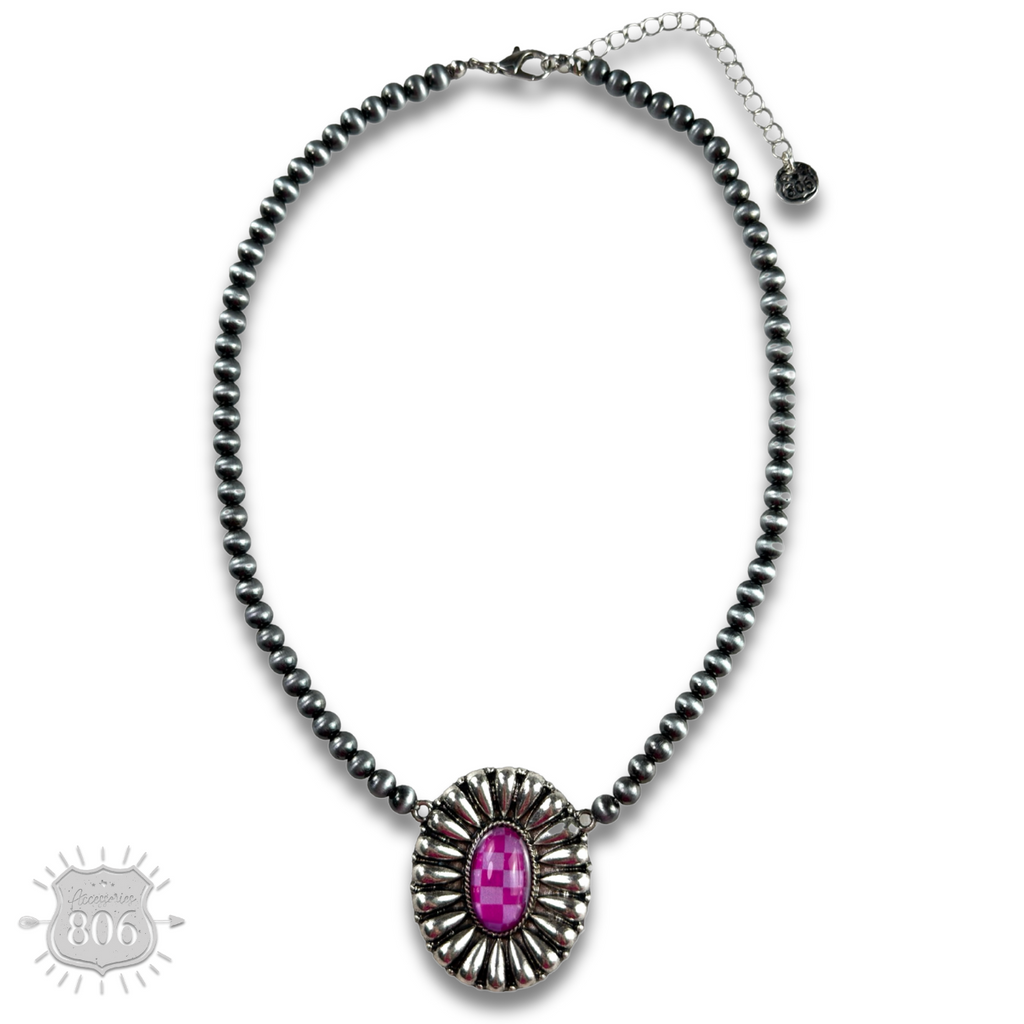 Western sunburst pendant on burnished silver bead necklace