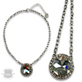 Large round pendant on silver link chain necklace
