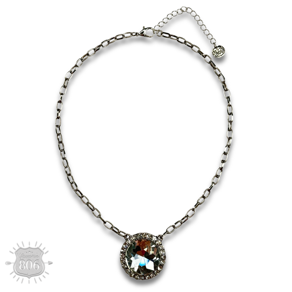 Large round pendant on silver link chain necklace