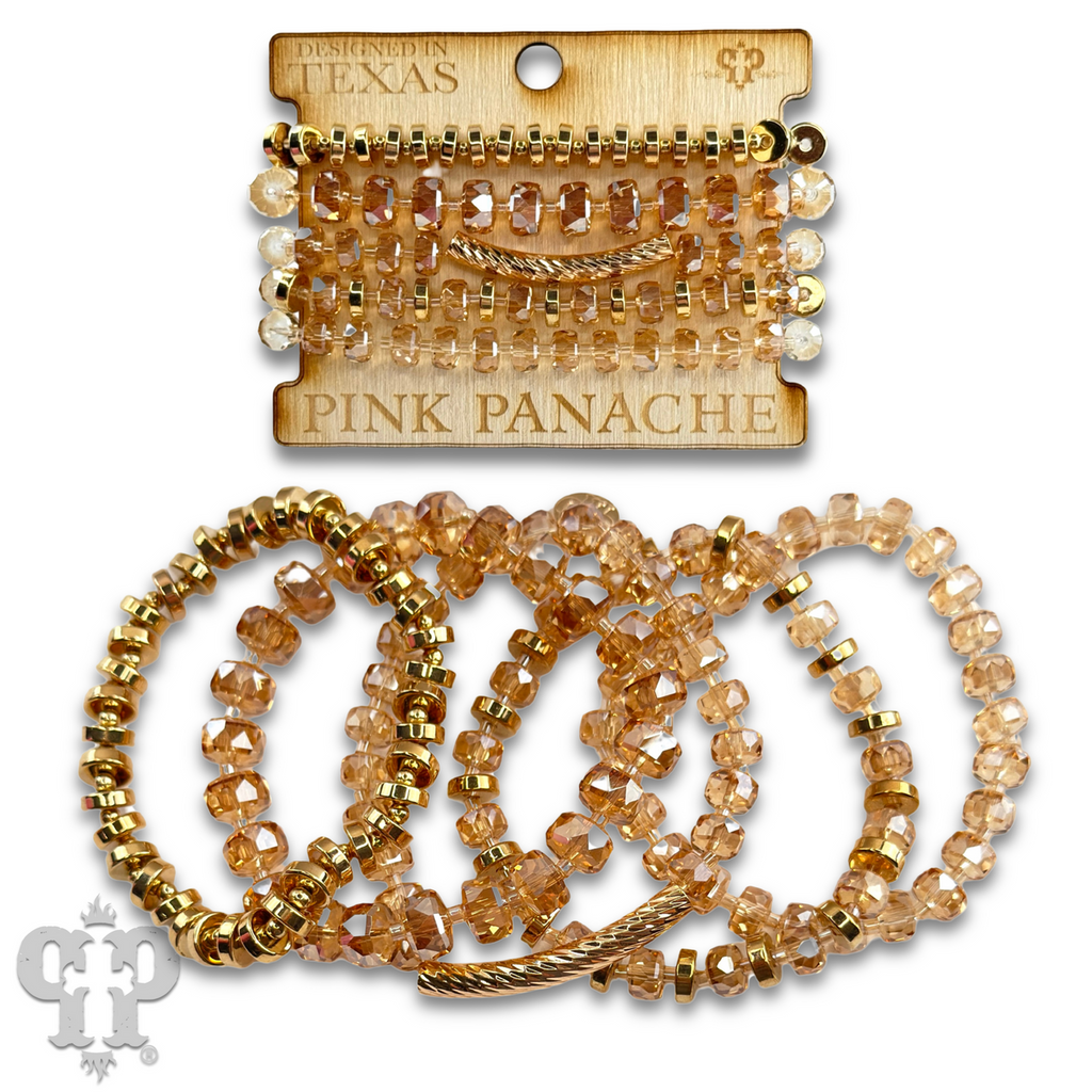 Faceted heishi bead bracelet with twisted tube bead feature