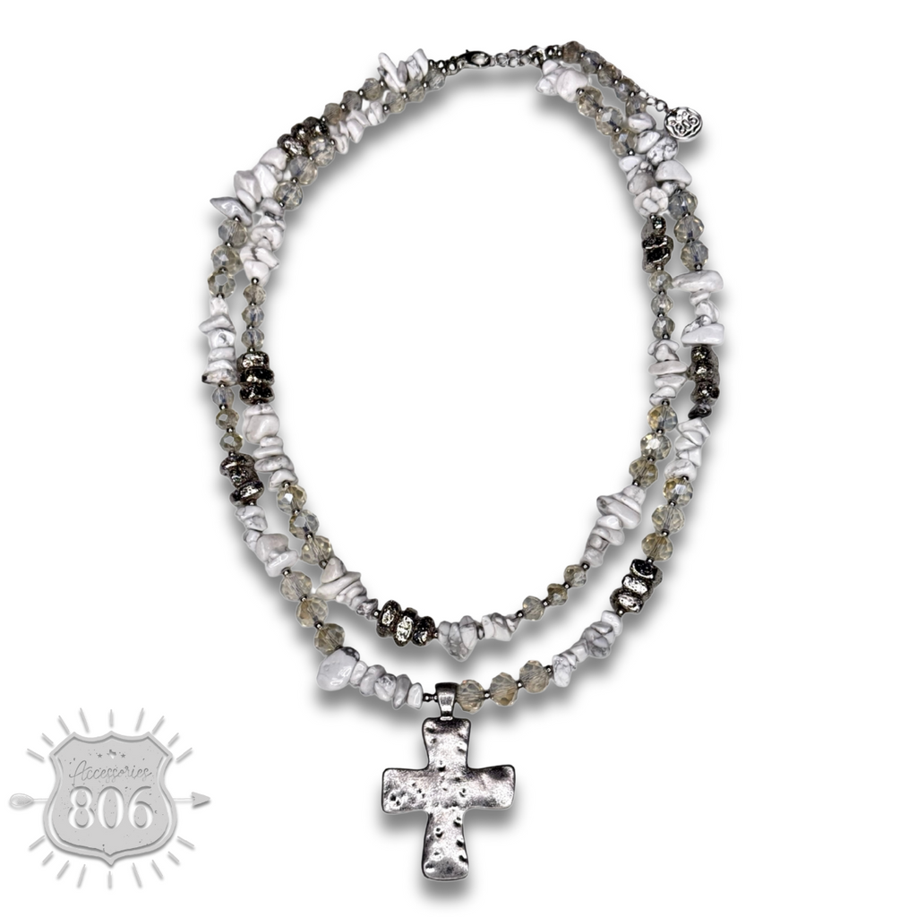 Textured cross pendant on chip stone double strand necklace